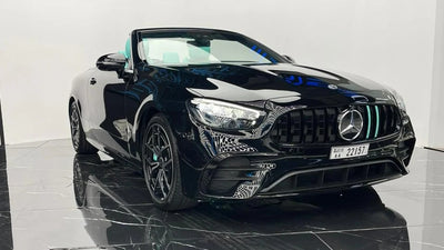 Luxurious black Mercedes E53 AMG executive sedan, front view, ready to rent in Dubai.