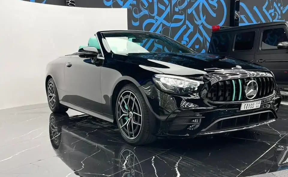 Elegant side profile of a Mercedes E53 AMG rental, showcasing sleek design, in Dubai.