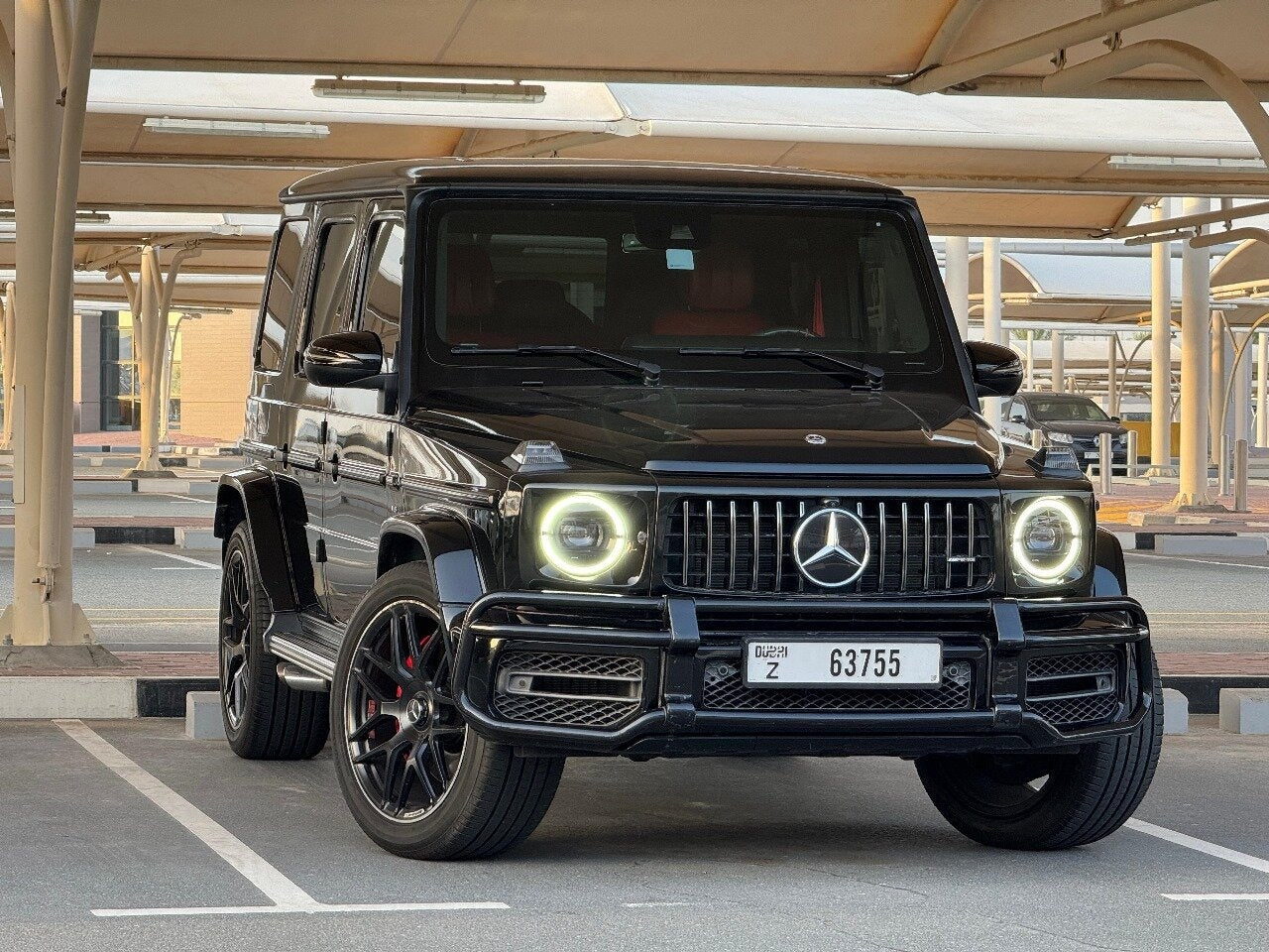 Rent this iconic Mercedes G63 AMG in Dubai - front angle highlighting the aggressive grille and LED headlights.