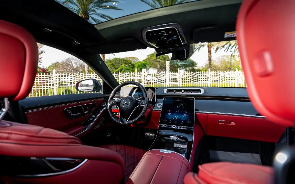 Mercedes S500 Executive Sedan's spacious and luxurious back seat, ideal for business rentals in Dubai.
