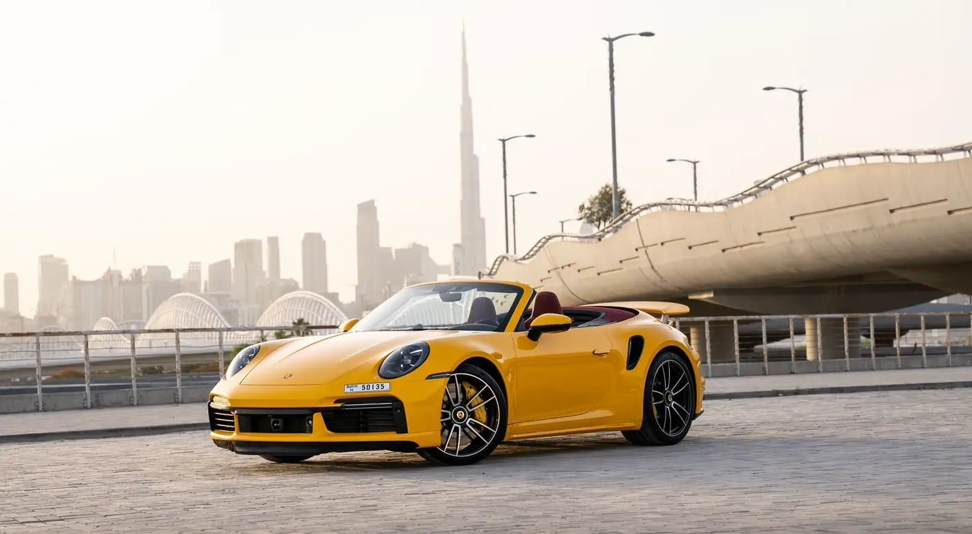 Luxury Porsche 911 Turbo S front view, high-performance rental sports car in Dubai.