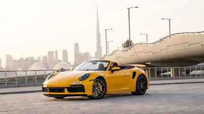 Luxury Porsche 911 Turbo S front view, high-performance rental sports car in Dubai.