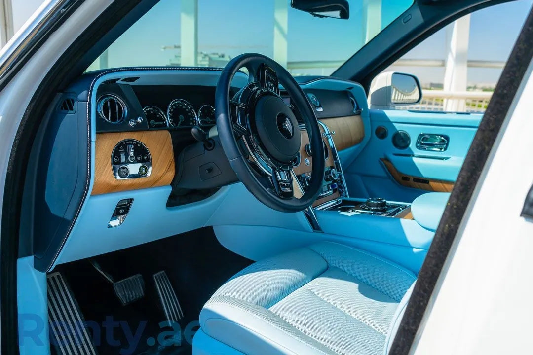 Rolls Royce Cullinan cruising on Dubai roads, demonstrating its powerful presence and unmatched luxury SUV rental experience.