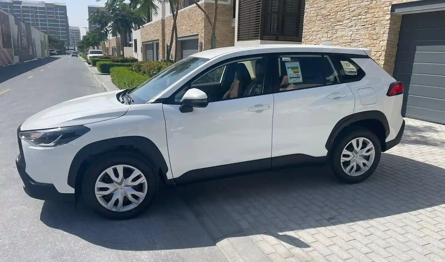 Spacious interior of Toyota Corolla Cross for rent, perfect for comfortable driving in Dubai.