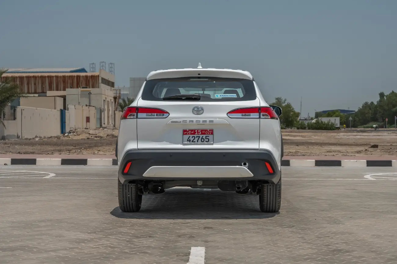 Rear angle of a Toyota Corolla Cross, emphasizing the economy SUV's ample boot space, available for rent in Dubai.