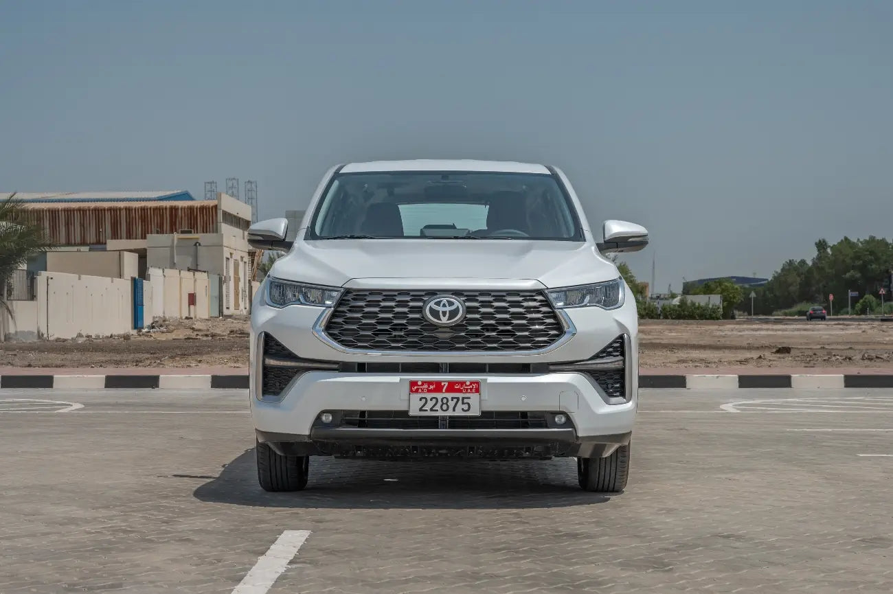 Spacious interior of Toyota Innova Hybrid showing plush seating, ideal for Dubai tours