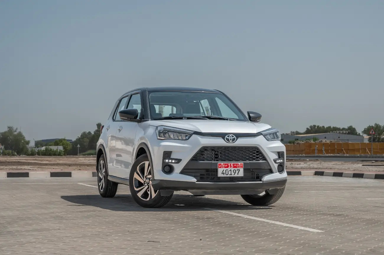 Brand-new Toyota Raize luxury SUV parked for rent in Dubai, showcasing its sleek design and advanced features.