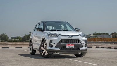 Brand-new Toyota Raize luxury SUV parked for rent in Dubai, showcasing its sleek design and advanced features.
