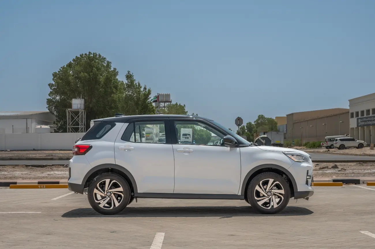 Close-up of the Toyota Raize's distinctive front grille and headlights, a luxury SUV option for rent in Dubai's upscale market.