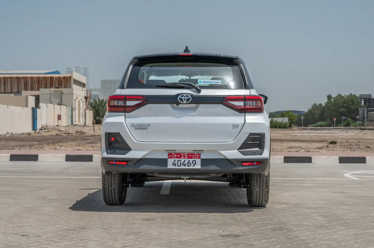 Toyota Raize luxury SUV in action, cruising on a Dubai highway, perfect for exploring the city in style and comfort.